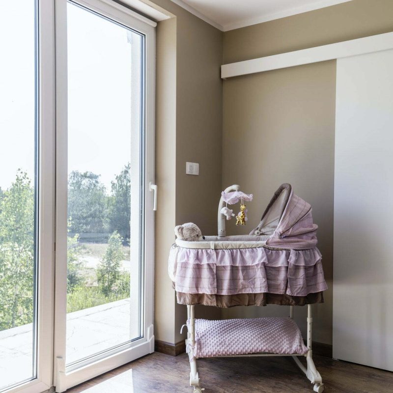 Bright nursery with adorable girly cradle